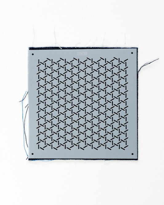 woven bamboo stencil on an indigo background