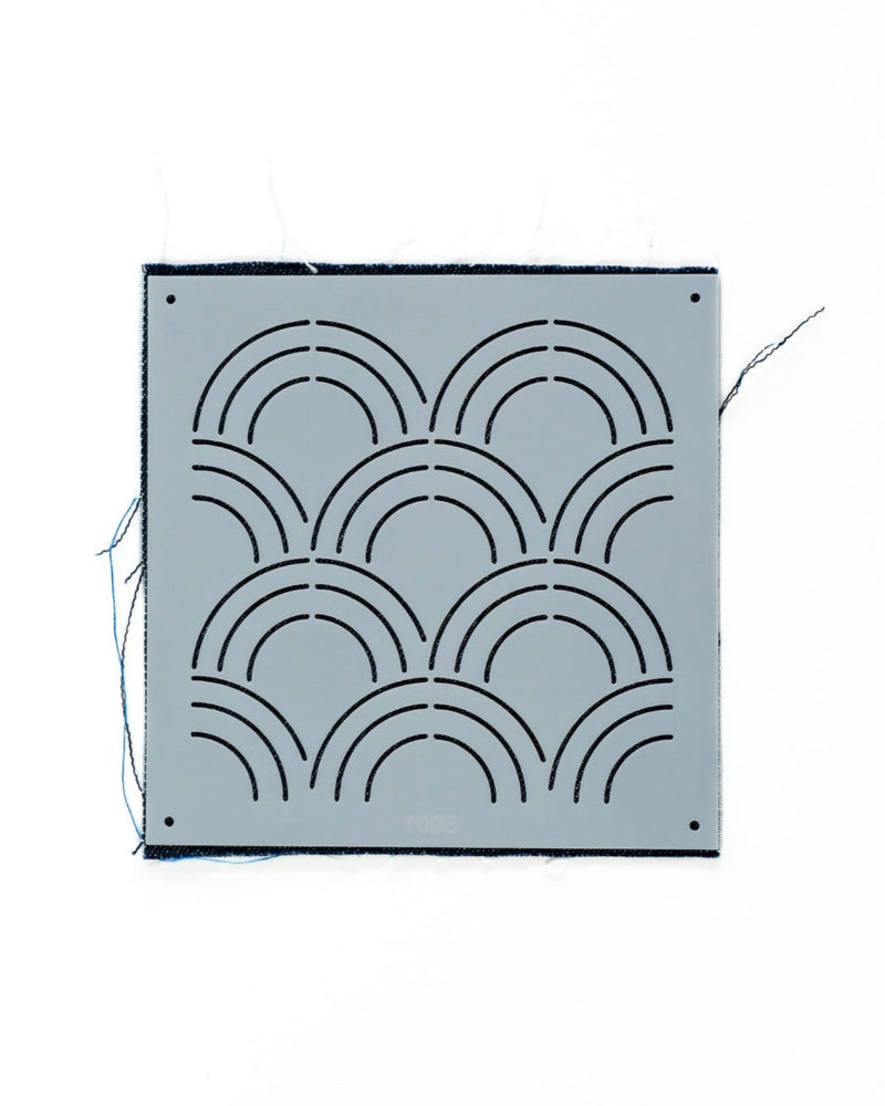 japanese wave plastic stencil on indigo swatch