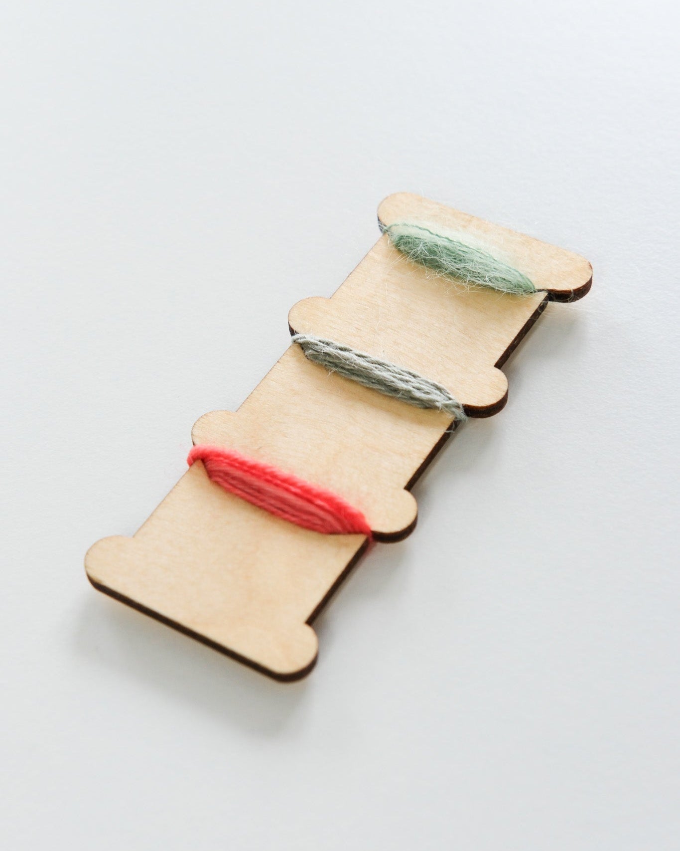 plywood thread organiser with cashmere threads