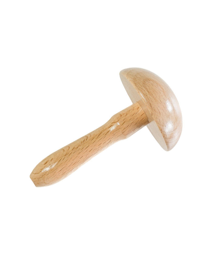 Darning mushroom on a white background