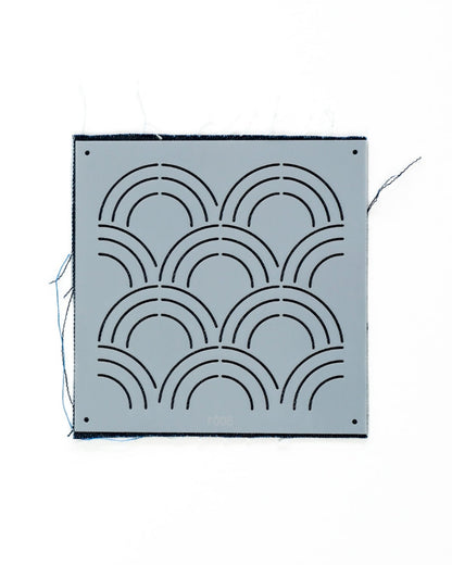 japanese wave plastic stencil on indigo swatch