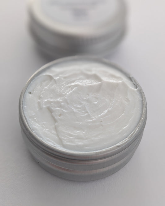 Silver container with white sashiko heat erasable on a light gray background